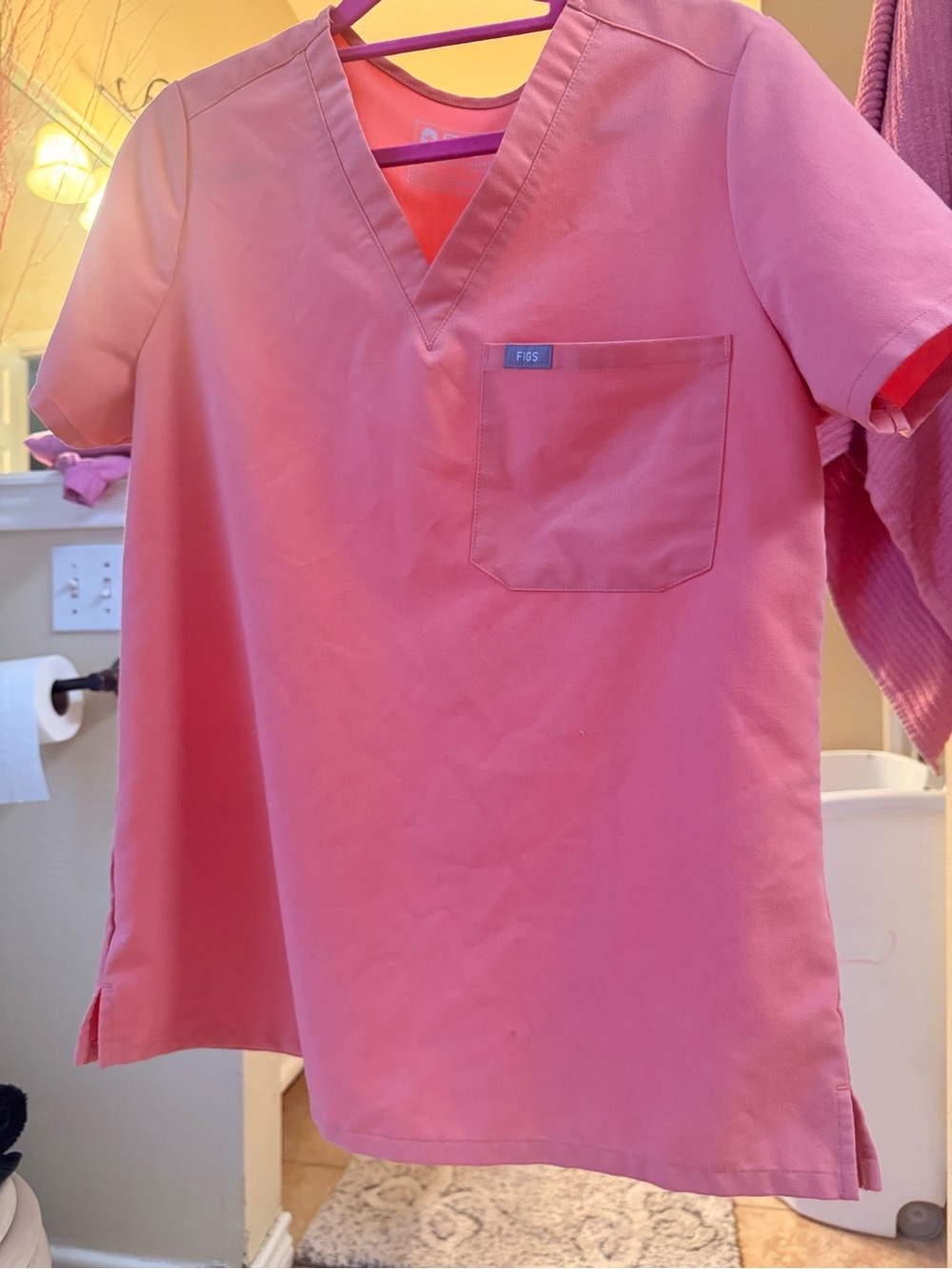 Shirt is size small- pants are size medium.
